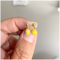 ★ ITEM DESCRIPTION: * 14k gold filled post 4mm ball ear hooks * Enamel mini tiny tennis balls The earrings measure 0.5 inches (12mm) from top to bottom. Necklace available here: https://www.etsy.com/listing/655758357 Gold filled is different than gold plated. The value of gold-filled is greater than gold-plated because gold-filled has an actual layer of karat gold, not just a microscopic film. It is an actual layer of 14k yellow gold or 20k rose gold that is pressure bonded to a base metal. Beca Ball Earrings Gold, Tennis Earrings, Jewelry Cute, Ball Earrings, Tennis Balls, Tennis Player, Team Gifts, Tennis Ball, Pure Gold