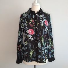 Tommy Hilfiger Button Down Top Point Collar Semi Sheer Fabric 3/4 Roll Tab Sleeves Floral Motif With Contrast Collar/Cuffs Button Front Closure Polyester Approximate Measurements Shoulder Seam To Cuff 24.5 In Shoulder To Hem 24.5 In Armpit To Armpit 19 In ** If This Is Your First Time Buying On Poshmark, Use Code Paamscloset At Sign Up To Get $10 Off. Black Collared Blouse With Floral Print, Tommy Hilfiger Long Sleeve Blouse For Spring, Tommy Hilfiger Long Sleeve Blouse, Summer Black Blouse With Button Cuffs, Tommy Hilfiger Spring Workwear Shirt, Black Summer Blouse With Button Cuffs, Black Shirt With Button Cuffs For Spring, Black Office Blouse With Covered Buttons, Office Blouse With Covered Buttons In Black