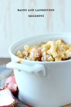 a white bowl filled with macaroni and cheese