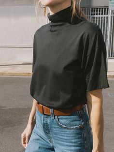 This style is on back-order and is expected to be in stock 10.25.24-10.30.24. Your go-to turtleneck met your every day oversized tee. The result? A new, chic essential. (This one comes in Jet Black.) | Fable Turtleneck Top in Jet Black | Ethical Essentials Nation Ltd, New Chic, Turtleneck Top, Turtle Neck Top, Oversized Tee, Jet Black, Every Day, Turtle Neck, Black