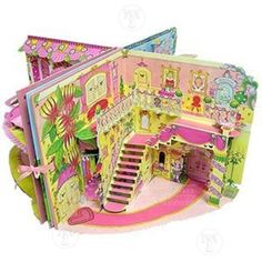 a doll house with stairs and lots of furniture in the front door, on a white background