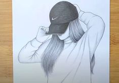 a drawing of a girl with a hat on her head covering her face from the wind