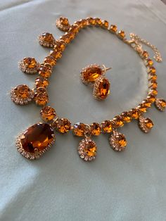 "TOPAZ Crystal STATEMENT Necklace by Lady Detalle 16k gold plated gorgeous sparkly TOPAZ crystal stones Victorian Necklace, Georgian Paste Jewelry LIMITED EDITION, there is just ONE of these available! This gorgeous TOPAZ necklace is truly a unique necklace fit for upper class impressions, fancy occasions, or royalty or nobility of the English, French or European court and will work for multiple eras as extant versions of similar necklaces were seen in portraits for hundreds of years: stunning a Gold Crystal Necklaces For Celebration, Gold Cubic Zirconia Crystal Necklaces For Jewelry Making, Gold Jeweled Crystal Necklace As A Gift, Gold Jeweled Crystal Necklace For Gift, Dazzling Gold Crystal Necklaces For Parties, Gold Cubic Zirconia Rhinestone Necklace For Formal Occasions, Gold Cubic Zirconia Crystal Necklace For Jewelry Making, Gold Crystal Necklace With Jewels For Parties, Gold Rhinestone Necklace For Formal Occasions