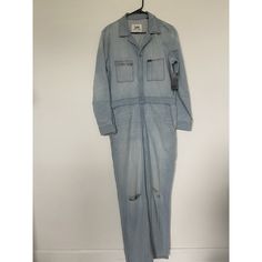 This Stylish Lee Union-Alls Jumpsuit Overall Is A Must-Have For Any Fashion-Conscious Woman. The Blue Denim Material Is Made Of A Comfortable Cotton Spandex Blend, While The Solid Pattern And Collared Neckline Give It A Classic Look. The Long Sleeves And Straight Leg Style Make It Perfect For Any Occasion, And The Zip Closure Ensures A Secure Fit. This One-Piece Jumpsuit Comes In Size L And Is Ideal For Women Who Want To Make A Fashion Statement. The Set Includes Jeans And Is Perfect For Those W Utility Light Wash Jumpsuits And Rompers, Light Wash Relaxed Fit Jumpsuit For Workwear, Light Wash Overall Jumpsuit For Work, Relaxed Fit Light Wash Overalls For Workwear, Light Wash Workwear Overalls With Pockets, Light Wash Relaxed Fit Overalls For Work, Light Wash Overalls With Pockets For Workwear, Utility Light Wash Overall Jumpsuit, Utility Light Wash Jumpsuits And Rompers In Overall Style