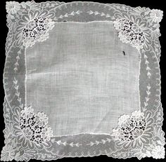 New old stock vintage wedding hanky with a fancy applique and lace border. Although never used, this hanky is slightly imperfect. Please view all photos, as you will see a couple of very small tears in the lace and a small tear in the linen center. Still very pretty, and perfect for a bride-to-be as her something old. All white, measuring 11 inches, and made of linen. Being sold AS IS, and priced accordingly. Vintage Lace Trim Handkerchiefs For Wedding, White Victorian Handkerchiefs With Lace Trim, White Victorian Handkerchief With Lace Trim, Victorian White Handkerchiefs With Lace Trim, Lace Handkerchiefs With Lace Trim For Wedding, Lace Wedding Handkerchiefs With Lace Trim, Vintage Wedding Handkerchiefs With Lace Trim, Lace Wedding Handkerchiefs With Lace Work, Wedding Lace Handkerchief With Lace Work