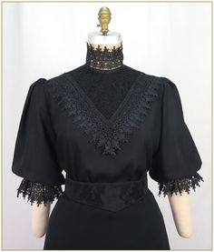 Viscose/Linen. Color: Black. Beautiful black linen blend woven fabric blouse with black front lace yoke trimmed with wide lace. Black lace trim for collar and edge of elastic elbow length sleeves. Lightly gathered full sleeves and button back and hook eye closures. Generously cut for comfort. Dry clean. Circa 1898-1910. Made in U.S.A. Sizes: SM, MED, LG & XLG. Blouses ordered by bust measurement, inches:  BUST           SIZES 32" - 34"     SMALL 35" - 39"     MEDIUM 40" - 44"     LARGE 45" - 49"     XLARGE Blouses ordered by bust measurement, centimeters: SMALL       81 cm - 86 cm MEDIUM    88.9 cm - 99 cm LARGE      101.6 cm - 111.76 cm XLARGE    114 cm - 124.46 cm HOW TO MEASURE TO DETERMINE YOUR SIZE: BUST: Measure the fullest part of your bust, we add the fitting ease and silhouette. A Fitted Formal Blouse With Lace Sleeves, Formal Fitted Blouse With Lace Sleeves, Fitted Blouse With Lace Sleeves For Formal Occasions, Fitted Lace Sleeve Blouse For Formal Occasions, Classic Formal Tops With Lace Sleeves, Formal Classic Tops With Lace Sleeves, Fitted Classic Lace Top With Lace Trim, Fitted Short Sleeve Lace Top For Work, Fitted Lace Top With Lace Collar For Work