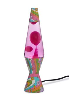 a pink lamp with an unusual design on it's side and a cord attached to the base