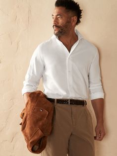 Understated yet refined, this classic cutaway collar shirt is made from luxuriously soft 100% cotton twill.  Cutaway collar.  Button down front French placket for a smooth finish.  Shirttail hem.  Slim fit.  Long sleeves.  Hip length.  Body length (s Elegant Cotton Dress Shirt For Daywear, Timeless Semi-formal Cotton Shirt, Timeless Cotton Dress Shirt With Fold Down Collar, Timeless Cotton Collared Dress Shirt, Timeless Cotton Dress Shirt, Timeless Semi-formal Cotton Dress Shirt, Unstructured Collared Dress Shirt For Business Casual, Unstructured Collared Dress Shirt For Workwear, Elegant Cotton Dress Shirt With Lapel Collar