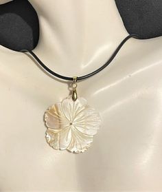 "White  Mother of Pearl Flower Pendant Necklace , Abalone Necklace, White Shell Pendant Necklace  Pendant is 2 \" Long with the connector bale x 1 1/4\" wide. 18\" cord + 2\" extension Please know that due to the shell , they are not exactly the same. There may be a little more of tan on parts of the shell or a little less. Please check through my other listings ! If you have any questions, feel free to ask as I do not accept returns ! Thank You for stopping by" White Pendant Necklace, Shell Pendant Necklace, Big Pendant Necklace, Dope Jewelry Accessories, Abalone Necklace, Mother Of Pearl Necklace, Dope Jewelry, Make A Plan, Flower Pendant Necklace