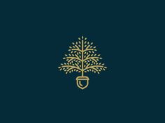 a gold tree on a black background with the letter c in it's center