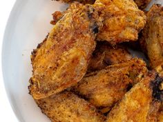 some fried food on a white plate ready to be eaten