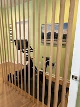 a bike is parked behind bars in a room