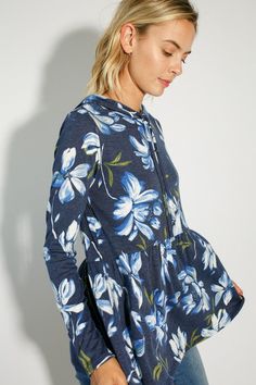 FLORAL PRINT JERSEY BABYDOLL WITH HOODIE CASUAL TOP- Floral print jersey babydoll with hoodie casual top- Long sleeve- Hoodie with self drawstring- Relaxed fit tunic length- Floral print jersey- Model is 5' 8" 31-24-35 and wearing a Small- 87% POLYESTER, 10% RAYON, 3% SPANDEX- MADE IN U.S.A Style: Casual Print / Pattern: Floral print Fit: Relaxed fit Embellishment: Hoodie Sleeve: Long sleeve Lining: No Made In: United StatesFabric Contents: 86% POLYESTER, 10% RAYON, 4% SPANDEXNon-sheer fabricCare Instructions: Machine wash cold, Do not bleachSize Measurement (inch): S: 36.0-38.0 (Bust), null (Waist), null (Hips), null (Length) M: 38.0-40.0 (Bust), null (Waist), null (Hips), null (Length) L: 40.0-42.0 (Bust), null (Waist), null (Hips), null (Length) Casual Spring Hoodie Top, Casual Long Sleeve Tops With Drawstring Hood, Blue Long Sleeve Top With Drawstring Hood, Casual Floral Print Tops For Winter, Casual Blue Top With Drawstring, Relaxed Fit Hooded Top For Spring, Spring Loungewear Hoodie Tops, Hooded Spring Loungewear Top, Blue Floral Print Top For Winter