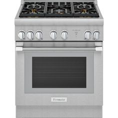 a stainless steel stove with four burners and two oven doors on the front side