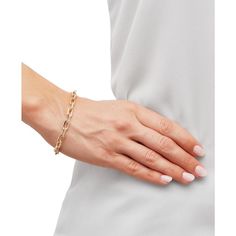 Make a style statement with the polished and textured design of this stunning cable link bracelet..Set in 10k gold.Approx. length: 7-1/2'; approx. thickness: 5-3/4mm.Lobster clasp closure.Made in Italy.Sign up for Macy's WorryNoMore® Jewelry & Watch Protection program within 30 days of purchase. Before delivery, call Customer Service 1-800-289-6229 to sign up. After delivery, visit a Macy's store with your dated receipt and jewelry purchase to sign up..Photo may have been enlarged and/or enhanced. Modern Gold Diamond Bracelet With Rectangular Links, Elegant Diamond Bracelet With Cable Chain, Luxury Oval Link Chain Bracelet, Modern Gold-tone Jubilee Bracelet, Luxury Paperclip Chain Link Bracelet, Gold Cable Chain Bracelet, Formal Yellow Gold Paperclip Bracelet, Gold Diamond Bracelet With Cable Chain, Oval Link Chain Diamond Bracelet