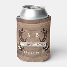 a wooden can cooler with antlers on it and the words ab, the hunt is over charleston sc