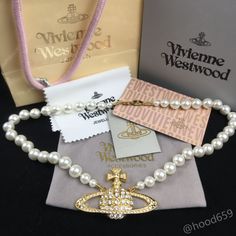 "Brand New With Box,Dust Pouch And Cloth 1 Row Faux Pearl Bas Relief Necklace Approx Longth 20” Saturn It Is Large, Approx 2.5” Long X 1.5” H Metal Brass Alloy Accept Reasonable Offer" Designer White Necklaces For Gifts, Vivienne Westwood Pearl Necklace, Vivienne Westwood Bracelet, Vivienne Westwood Jewelry, Vivienne Westwood Earrings, Rose Gold Choker, Vivienne Westwood Jewellery, Saturn Necklace, Chunky Pearls