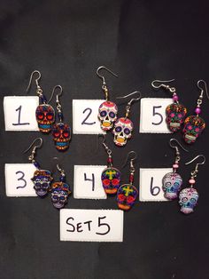 HANDMADE SUGAR SUGAR EARRINGS set 5 --choose from #1-6 and that exact one you will receive :) If you would like many please message us :) DETAIL IS AMAZING! NOT ONE IS THE SAME! COOLER IN PERSON! Set 5 Multicolor Halloween Earrings For Gift, Multicolor Halloween Earrings Gift, Handmade Skull Earrings For Day Of The Dead, Handmade Earrings For Day Of The Dead, Bohemian Skull Earrings For Gifts, Handmade Skull Earrings For Halloween, Bohemian Halloween Earrings As Gift, Bohemian Earrings For Halloween Gift, Bohemian Halloween Gift Earrings