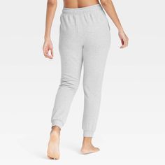 Stay effortlessly cozy as you lounge around the house wearing these Fleece Jogger Pants from Auden™. Made from ultra-soft, brushed fleece fabric for a relaxed, easy fit that's perfect for lounging, these joggers are designed with a regular rise and tapered legs. The front drawstring tie provides a customizable fit, while side pockets give you space for stashing small essentials. Auden™: Comfort true to every shape & hue. Cozy Long Pants For Leisure, Cozy Cotton Bottoms For Lounging, Cozy Sweatpants For Spring Lounging, Cozy Spring Sweatpants For Loungewear, Cozy Spring Lounging Sweatpants, Cozy Cotton Bottoms For Relaxation, Comfy Bottoms With Comfort Waistband, Comfy Bottoms With Comfort Waistband For Relaxation, Comfy Relaxed Fit Bottoms For Home