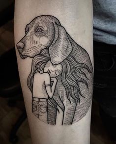 a person with a dog tattoo on their arm and the caption reads, i love you