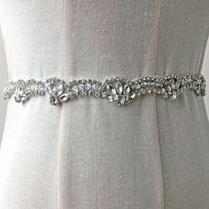 This clear and sparkling rhinestone trim , looks more beautiful in person! you can trim short ,it is better cut with the line of rhinestone,which is nice pieces on any craft projects Fine workmanship ,beautiful and in delicacy, the crystal patch can arranged by your own . the beautiful applique can be made in nice neckline collar ,bridal gloves, wedding garters, bridal veil,costumes belt,crafting any sort of stuff. appliques for clothes, dress, hat, garment clothing. Perfect for wedding dresses Elegant Bedazzled Bridal Accessories For Party, White Crystal Bridal Belt For Party, Elegant Silver Bedazzled Bridal Accessories, Elegant Bedazzled Silver Bridal Accessories, Diamond Rhinestone Necklace For Wedding, Diamond Rhinestone Necklace For Wedding, Sparkling, Wedding Diamond Rhinestone Necklace, Sparkling Rhinestone Diamond Necklace For Weddings, Dazzling White Rhinestone Necklace