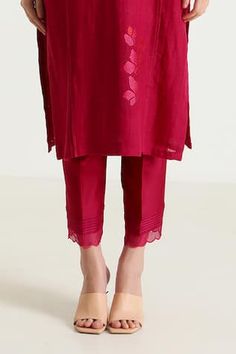 Fuchsia pink kurta with thread placement embroidery in floral pattern. Paired with pant. - Aza Fashions Pink Chikankari Embroidery Pants For Eid, Elegant Pink Pants For Eid, Pink Cutwork Sets For Eid, Pink Cutwork Sets For Festive Occasions, Festive Pink Cutwork Sets, Festive Pink Kurta With Cutwork, Elegant Pink Cutwork Set, Elegant Pink Sets With Cutwork, Festive Pink Cutwork Kurta