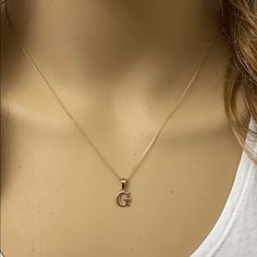 10k Rose Gold Initial Letter G Pendant Necklace Mini Small Metal Type: 10k Solid Yellow Gold (Also Available In 14k Solid Gold) Metal Color: Yellow Gold. (Also Available In White Gold And Rose Gold) Measurement: Height Including Bail: 0.60 In (15.79 Mm) Width: 0.18 In (4.80 Mm) - 0.45 In (11.32 Mm) Pendant Only Weight: 0.6 Grams Pendant W/Chain Weight: 1.6 - 1.8 Grams (Vary From Chain) Chain Available In 16", 18", 20", 22" Brand New. Available In Any Letter A-Z Made To Order. Please Allow 5-7 Da Initial Necklace G, Classic Rose Gold Initial Necklace For Formal Occasions, Classic Rose Gold Initial Necklace, G Initial Necklace, Initial Necklace Gold Letters, G Necklace, Rose Gold Initial, Cross Necklace Sideways, Shine Jewelry