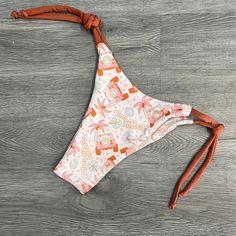 Your quick trip to the beach shouldn't be a struggle. These bottoms are adjustable and cheeky, giving you the perfect fit so you can throw on your favorite top and head out the door. The cute Jeep print and "Mermaid off Duty" design makes this bottom irresistible!Matching Sierra NV Top HEREMatching Triangle Top HEREMatching Scrunchie HERE Tie-side Bottoms For Beach Party, Stretch Tropical Bottoms For Beach Party, Beach Season Tie-side Bottoms For Beach Party, Fun Stretch Swimwear For Beach Party, Beach Party Tie-side Bottoms, Printed Vacation Bottoms For Beach Party, Printed Bottoms For Beach Party Vacation, Tropical Bottoms For Beach Season Sunbathing, Fitted Playful Beach Season Bottoms