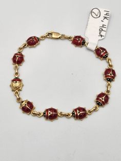 This is a 14k yellow gold bracelet with red enamel ladybugs  linked together. This bracelet is unique because it has one ladybug that is different from the rest. It would be a great gift for someone that stands out or is special to you. The ladybugs are 8mm wide and the bracelet is 7 inches long when clasped. The total weight is 4 dwt or 6.2 grams and the back of the one ladybug is stamped with 14k and Italy. Bug Bracelet, Ladybug Bracelet, Dope Jewelry, Yellow Gold Bracelet, Girly Jewelry, Jewelry Inspo, Dream Jewelry