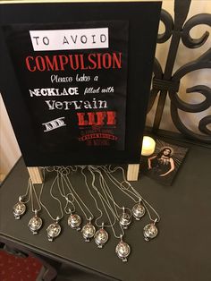 a sign that says to avoid compulsion with necklaces and life charms