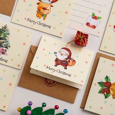 christmas cards with santa claus and reindeer on them next to a potted plant, ornament