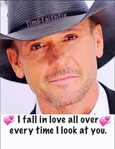 a man wearing a hat with the words i fall in love all over every time look at you