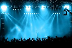 an image of a concert scene with blue lights