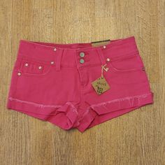 Almost Famous Pink Jean Shorts Front Pockets And Back Pockets Belt Loops Double Button And Zipper Closure Short Zipper Frayed Cuffs Made Of 97% Cotton 3% Spandex Junior Sizes 5, 9, 13. Brand New Hot Pink Jean Shorts, Pink Buttoned Summer Bottoms, Pink Summer Bottoms With Buttons, Scene Jeans, Pink Summer Bottoms With Button Closure, Pink Summer Pants With Button Closure, Trendy Shorts With Button Closure, Pink Cotton Bottoms With Button Closure, Trendy Pink Bottoms With Button Closure