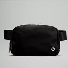 Brand New, Still In Plastic Blk Lululemon Everywhere Belt Bag. Great For On The Go Travel. Can Be Use Across The Waist Or As A Crossbody Bag. Exterior Zippered Pocket To Secure Your Valuables. Interior Pockets Hold The Essentials. Bag Dimensions: 19cm X 5.5cm X 13cm (7.5" X 2" X 5") Volume: 1l Strap Length When Fully Extended: 16cm (41.7”) Questions? Leave A Comment Below! Lululemon Bags, Lululemon Everywhere Belt Bag, Everywhere Belt Bag, Festival Bag, Black Crossbody, Metallic Logo, Black Belt, Bag Straps, Large Bags