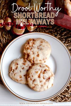 three shortbread mellows on a white plate with text overlay that reads, drool worthy shortbread mellows