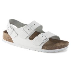 The Milano sandal adds an adjustable backstrap to its classic two-strap design giving you more security and a fit that's just right. Featuring tonal buckles and a color coordinated sole to take the look to the next level. Complete with classic BIRKENSTOCK design elements like adjustable buckle closures and a contoured cork-latex footbed for the ultimate in support. The upper is made from high-quality soft natural leather. Anatomically shaped cork-latex footbed Upper: natural leather Footbed lini White Sport Sandals With Buckle Closure, White Sport Sandals With Buckle Closure And Round Toe, White Sport Sandals With Buckle And Ankle Strap, Classic Sandals With Double Strap And Heel, Classic Double Strap Sandals With Heel Strap, Classic White Sandals With Leather Footbed, Classic White Footbed Sandals For Spring, Classic White Sandals With Heel Strap, White Footbed Sandals With Ankle Strap