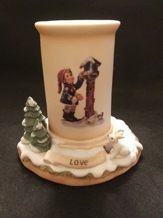 "A lovely limited edition candle holder from The Bradford Exchange.  It features \"Love\" by M.J. Hummel \"The Warm Glow of Winter Collection\".  It is in excellent vintage condition." Bradford Exchange, M J, Winter Collection, Candle Holder, Candle Holders, Limited Edition, Figurines, Collectibles, Statue