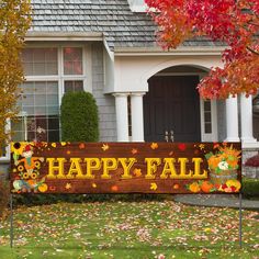 a happy fall sign in front of a house