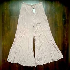 Nwt Boutique Flawless Wide Leg Pink Palazzo Pants Women’s Dress Pants Medium M New With Tags! Popular Boutique Brand Flawless Size: Medium Wide Flowy Legs Pockets At The Hips Pretty Blush Pink Color Elastic Waist For A Perfect Fit! Lining Around The Top So That You Can’t See Through Them Chic High Waist Rayon Bottoms, Fitted Wide Leg Pants For Summer, Solid Color Bottoms For Summer Night Out, Fitted Bottoms With Elastic Waistband For Brunch, Fitted Rayon Bottoms For Day Out, Fitted Rayon Pants With Elastic Waistband, Flare Bottoms In Solid Color For Summer, Solid Flare Bottoms For Summer, Flared Solid Bottoms For Summer