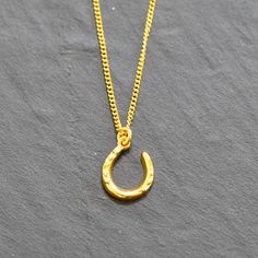 15ct Yellow gold horse shoe pendant circa 1880. On a new 18ct yellow gold curb chain.  Weight:    3.0 grams Chain Length:  41 cms Each and every piece listed by Vintage Fine Jewellery has been restored by hand in our London workshop by highly skilled jewellers. Our jewellers use the same expertise to restore a piece of jewellery, as were used in their creation many years ago. If you would like to see more of the Vintage Fine Jewellery Collection, visit us at: www.vintagefinejewellery.com We ship Gold Horseshoe Jewelry With Adjustable Chain, Gold Horseshoe Necklace With Adjustable Chain, Gold Hallmarked Horseshoe Jewelry, Gold Engraved Horseshoe Jewelry, Gold Horseshoe Necklace For Gift, Gold Horseshoe Necklace For Good Luck, Classic Horseshoe Gold Necklace, Horseshoe-shaped Yellow Gold Jewelry Gift, Classic Yellow Gold Horseshoe Jewelry