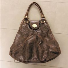 Beautiful Mottled Brown Leather. Large Magnetic Back Pocket. Turn-Lock Closure At Front. Large Zipper Pocket. Double Handles. A Couple Small Spots On Bottom. Vintage Purse, Spot On, Zipper Pocket, Brown Leather, Handles, Bag Lady, Purse, Zipper, Turn Ons