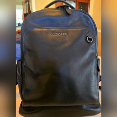 Gently Used Mens Coach Black Leather Backpack; Lots Of Pockets On The Inside Designer Black Leather Rectangular Backpack, Designer Black Rectangular Leather Backpack, Classic Black Leather Backpack, Designer Black Leather Travel Backpack, Designer Black Leather Backpack For Travel, Designer Black Leather Backpack For Business, Classic Black Leather Backpack For Formal Use, Designer Black Leather Backpack For Everyday Use, Classic Black Leather Backpack For Formal Occasions