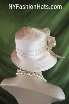 "Ladies Classic Champagne Beige Custom Made Slant Abstract Stylish Down Brim Satin Formal Designer Fashion Hat. This Elegant Dress Hat Is Embellished With A Large Satin Decorative Bow Embossed With Delicate Small Acrylic Rhinestones Throughout The Bow.  Crown Measures 22.5\". Standard Sized Fits Most Women Condition Is New Custom Made This Formal Champagne Beige Hat Is Suited For Weddings, Formals, Church, Shabbat, Mother Of The Bride Or Groom, Formal Special Occasion Events And Holidays. All Sa Church Lady Hats, Bespoke Hats, Large Brim Hat, Royal Ascot Hats, Veiled Hats, Formal Occasion Dress, Couture Hats, Beige Hat, Gold Hats