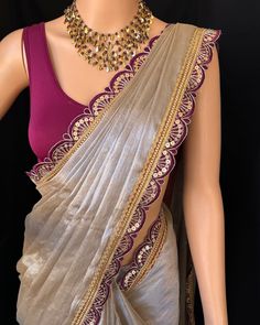 Silver mettalic tissue saree with contrast magenta golden lace all over sarees. Comes with beautiful big magenta thread tassels on pallu. Blouse: running blouse 80cm. To find this product in website: Www.thejacouture > Tissue sarees> silver mettalic tissue saree. Jewellery collaboration: @anvi__jewellery #mettalictissuesaree #silversaree #fancysaree #tissuesaree #trendingsaree #tissuelacesaree Saree Inspiration, Golden Saree