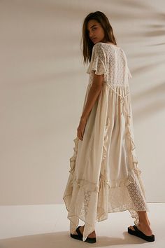 Romantic and ethereal, this sweet midi from our free-est collection is a true throw-on-and-go staple. **Fit:** Shapeless, babydoll-inspired silhouette **Features:** Square neckline, embroidered lace piecing, ruffle trimming throughout, back tie closure, flutte sleeves **Why We ❤ It:** Laid back with sporty sneakers or elevated with sleek platforms, this style has endless ways to wear. | Bring The Romance Midi Dress by free-est at Free People in Tan, Size: XL Romantic Bohemian Aesthetic, Lace Dress Over Jeans, Godmother Aesthetic, Tulle Dress Midi, Ethereal Casual, Ethereal Outfit, Boho Attire, Girly Casual, Artisan Clothing