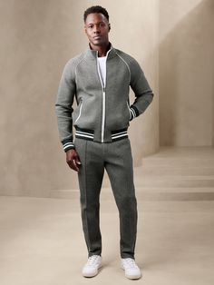 Athletic with a twist, this scuba-knit track pant is made from a sumptuously soft cotton blend with notable houndstooth — the perfect fusion of old-school style and modern athleisure.  TAPERED FIT: Mid rise.  Relaxed fit with a tapered leg.  Flat k Sporty Sweatpants With Straight Hem For Fall, Fall Joggers With Ribbed Cuffs And Tapered Leg, Fall Joggers With Ribbed Waistband And Straight Hem, Fall Tapered Leg Joggers With Ribbed Cuffs, Fall Sweatpants With Ribbed Cuffs And Straight Hem, Fall Athleisure Joggers With Straight Hem, Athleisure Sweatpants With Ribbed Cuffs For Fall, Athleisure Joggers For Workwear In Fall, Stretch Joggers For Workwear In Fall