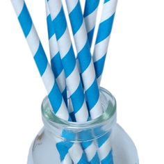 blue and white striped paper straws in a jar