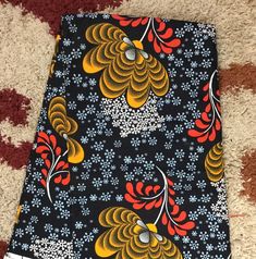 This black and gold African Fabric is high quality African print made from 100% cotton and it's 45 inches wide. It is used for making African Clothing, African quilts, & For Home decoration. FYI: Print is Double sided. The listing is for 1, 6 yards and Headwrap Each piece of fabric measures: 36in by 45in for 1 yard 216in by 45in for 6 yards 70in by 22in for Head wrap If you purchase more than one yard, you will receive one continuous piece. *If you require more than what I have listed, feel free Black Ankara Fabric With Batik Print, Black Fabric With Traditional Patterns, Traditional Black Fabric With Traditional Patterns, Traditional Ankara Fabric With Pattern Prints, Black Ankara Fabric With Traditional Patterns, Black Printed Cotton Patterns, African Headwrap, African Quilts, Clean And Press