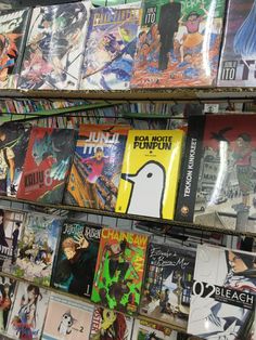 there are many comic books on the shelves